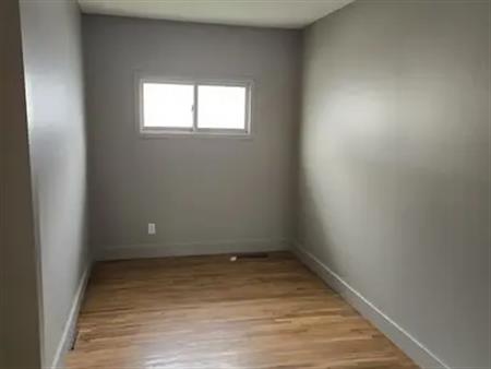 2 bedroom +den with large fenced backyard | Calgary