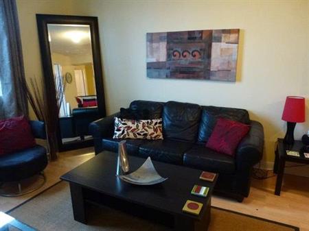 Available NOW, downtown one bedroom plus den condo