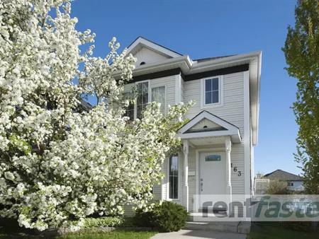 TWO STORY BRIGHT SUNNY NW HOME FOR YOU; TWO BEDROOMS & LOFTED DEN | 163 Hidden Cresent, Calgary