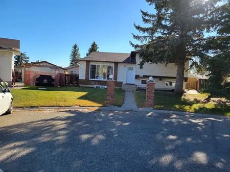3 bedroom 2 bathroom by-level main floor with deck and huge backyard | Calgary