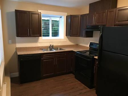 2 bedroom 1bath house laundry & reserved parking