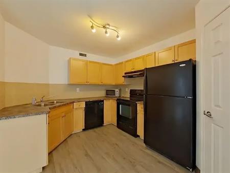 2 Bedroom SW Carriage Style Condo Includes Heat & Water & 2 Parking Stalls | 150 Edwards Drive Southwest, Edmonton