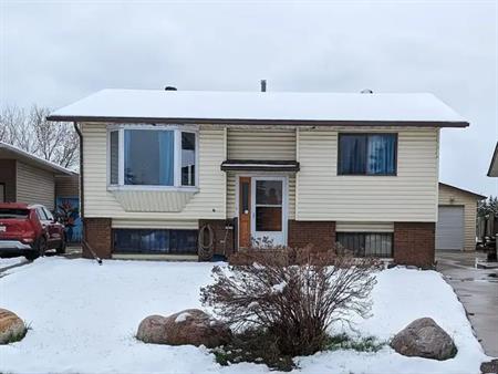 Detached home with great location to schools and LRT access. | Calgary