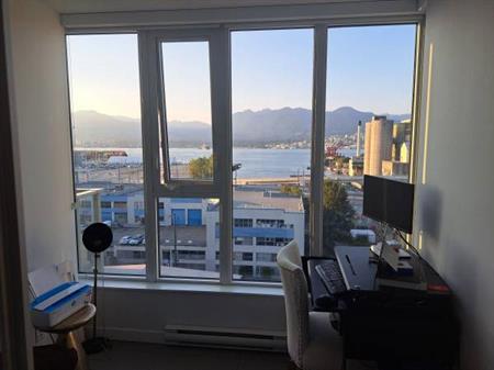 1.5 bedroom plus den facing the north shore; available mid November