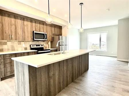 Near LRT Brand New 3B Townhouse in Shawnee Slopes | Shawnee Sq SW, Calgary