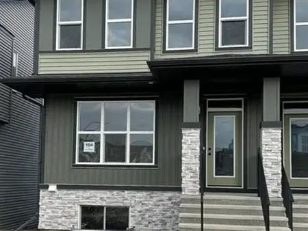 BRAND NEW 4 BEDROOM DUPLEX | 104 Edith Place North West, Calgary