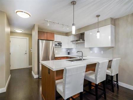 Spacious & Private Ground Level 1bed 1bath + Den Unit with Large Patio