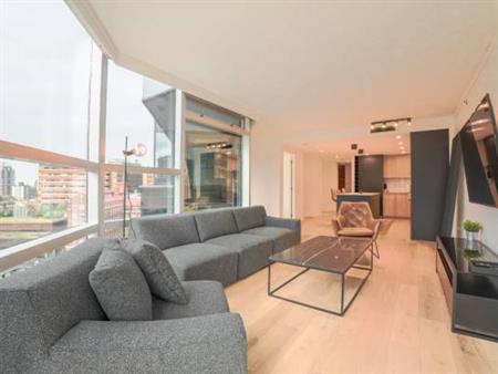 Elegant 2 Bed, 2 Bath Corner Suite with City Views and Office Den