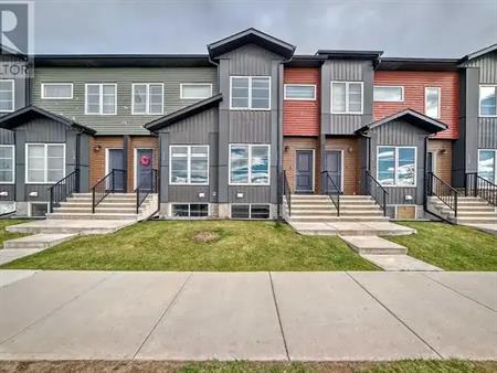 GREAT 3 BED 2.5 BATH, 2 STOREY TOWNHOUSE W/ DEVELOPED BASEMENT&ASSIGNED PARKING | 136 Red Embers Gate Northeast, Calgary