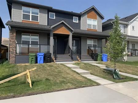 Duplex near walking and biking trails, dog park and golf course | 311 Wolf Creek Way Southeast, Calgary