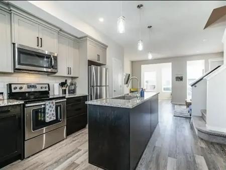 FULLY FURNISHED BEAUTIFUL EXECUTIVE TOWNHOME CORNERSTONE | Calgary