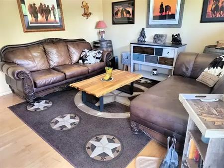 One price includes everything! Furnished main floor 2 bedroom suite | Calgary