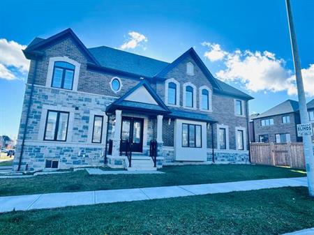 🏡 Stunning Luxury 4-Bedroom Home in Desirable Alcona by the Lake! 🏡