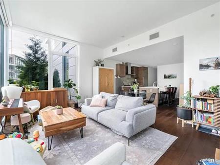 Stylish 2-Bedroom + Den Condo with Patio at Ivy on the Park –