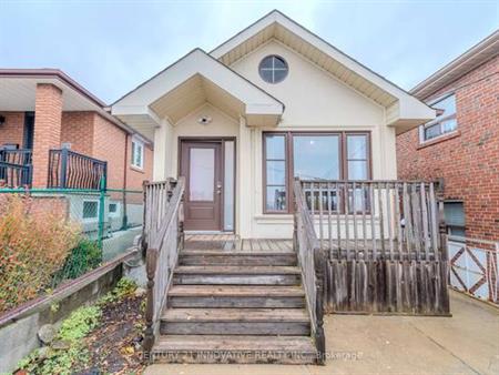 Beautifully Upgraded 2-Bed, 2-Bath Raised Bungalow! 2 Car Parking