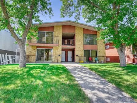 Crescent Heights: Main Floor in Fourplex | 3403 Centre Street Northwest, Calgary