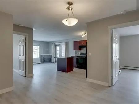 Bridgeland 2Bed 2Bath Walk Up Suite w/ UG Parking | 825 McDougall Road Northeast, Calgary