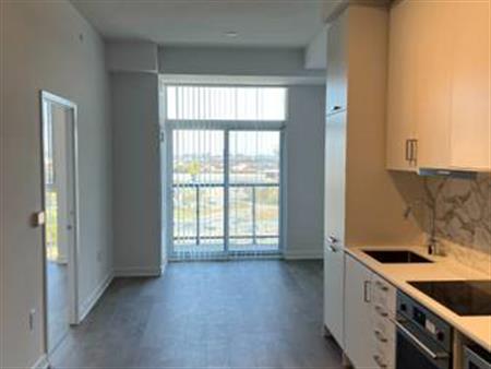 1 bedroom + big den condo; parking available (walk to subway)