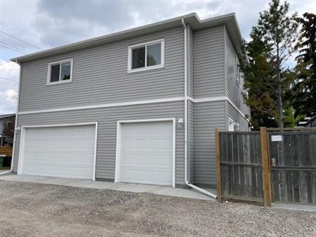 2 bedroom carriage house w/ 3 car heated garage