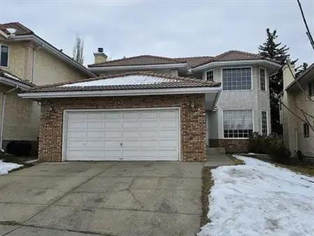 **Large family 3-Bedroom plus den home with double garage in Signal Hill** | 2136 Sirocco Drive Southwest, Calgary