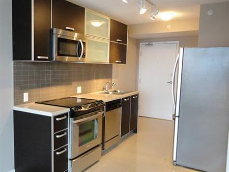 Modern 1 Bed, 1 Bath, Balcony, 1 Parking Stall & More!