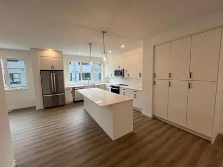 Brand New 3-Story Townhouse with Double Garage at Trinity Hill | 508 - 1453 Na'a Drive Southwest, Calgary