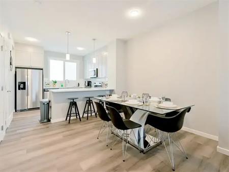 Fully FURNISHED 4 bedrooms Townhouse, Savanna Blvd - $2,500 | Calgary