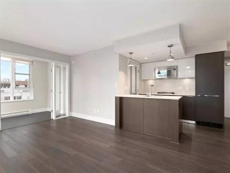 Quiet & bright Unfurnished 2Bdm northwest corner unit in modern CAMBIE