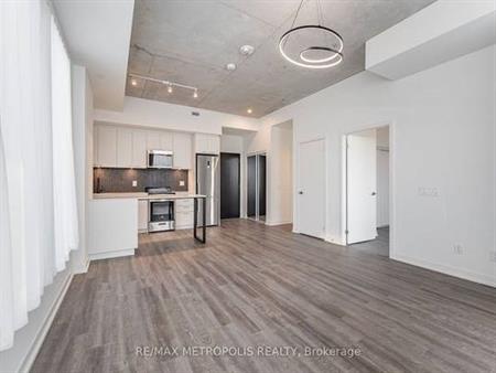 STUNNING CORNER UNIT LOFT WITH W/O TERRACE 1+1 PARKING INCLD