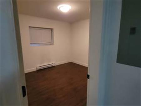 TWO BEDROOM FLOOR LEVEL BASEMENT SUITE