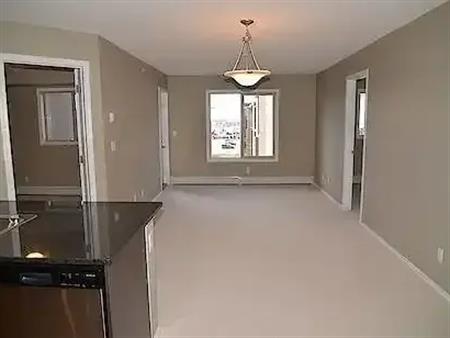 LAKEVIEW @ SADDLERIDGE 2BEDROOM/2BATH/DEN/HEATED PARKING | Calgary