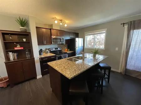 Double primary bedroom setup in Aura at Copperfield | 321 Copperpond Landing, Calgary