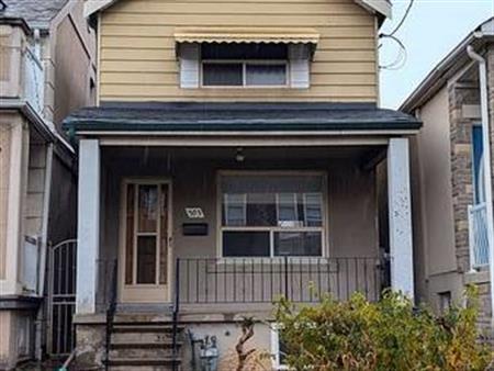 MUST SEE TWO LEVELS 2 BEDS 1 BATH WITH DETACHED DOUBLE CAR GARAGE