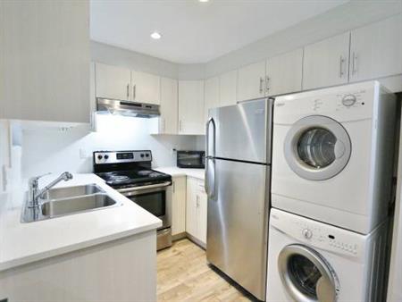 MODERN and very spacious 2 bedroom suite with patio!