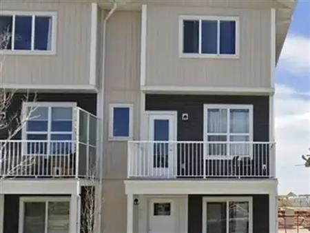 CORNER UNIT 3+1 Bedroom double garage, SS appliances | 401 - 137 Red Embers Way Northeast, Calgary