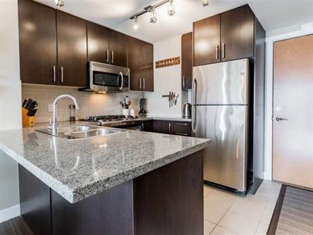 WALK TO SKYTRAIN FROM THIS 2 BED/2 BATH IN KLAHANIE