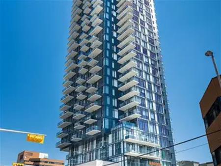 2BED 1BATH, FULLY FURNISHED ALL UTILITIES INC. STUNNING MOUNTAIN AND TOWER VIEWS | 1010 6th St SW, Calgary