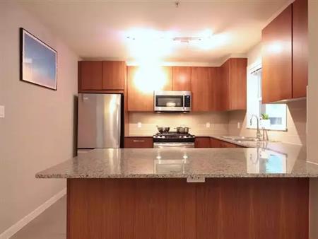 MacPherson Walk Spacious Corner Unit! | 5889 Irmin Street, Burnaby