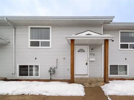 TWO MONTHS FREE RENT!!  Renovated Three Bedroom Townhouse | 32 Holmes Street, Red Deer