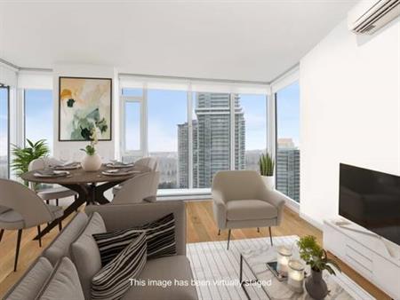 Spacious 2bd 2bath with A/C in one of Best Surrey central towers