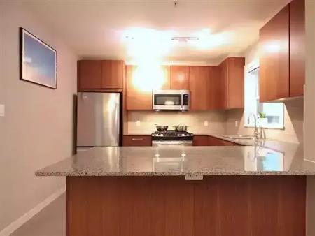 MacPherson Walk Spacious Corner Unit! | 5889 Irmin Street, Burnaby