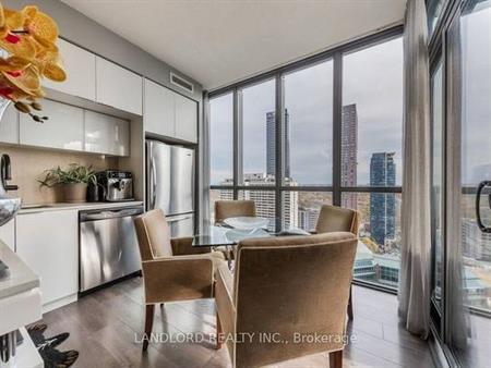 Bloor E/Ted Rogers Way-Open Bright 1Bd+Den w Murphy Bd &Cabinetry