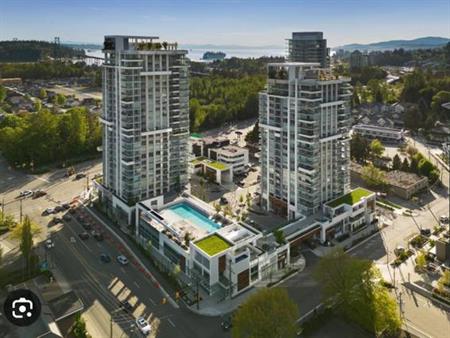 Luxury 1-Bedroom Condo with Stunning Lions Gate Bridge View! Prime Loc