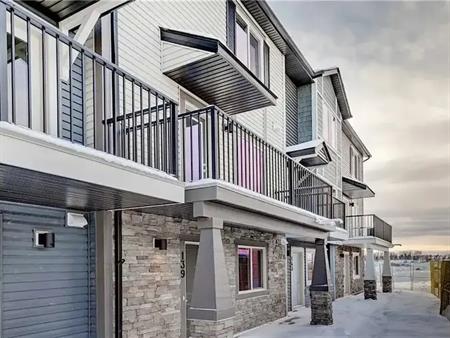 Spacious 2 Bedroom + Den + 2.5 Baths + Garage Townhouse | Calgary