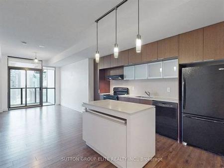 Bloor/Jarvis-Luxurious Immaculate Spacious 1Bd+Den w Parking