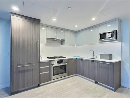 Brand New One Bed One Den Condo Walking to Skytrain