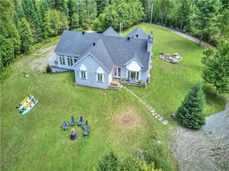 WATERFRONT: Indoor SPA, Spacious, Comfort, Nature at Grand Chalet Nominingue