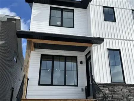 STUNNING BRAND NEW 3 BEDROOM PLUS 2.5 BATH AND A BONUS ROOM—-CREEKSTONE SW | Calgary