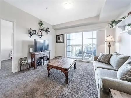 Beautiful 3rd Floor Condo with Stunning Pond Views | Calgary