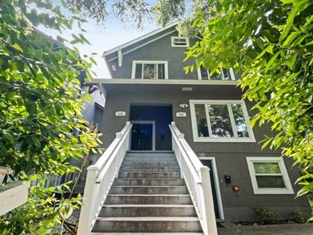 Heritage Elegance in Cambie: Charming 2 Bed, 1 Bath Home with Deck